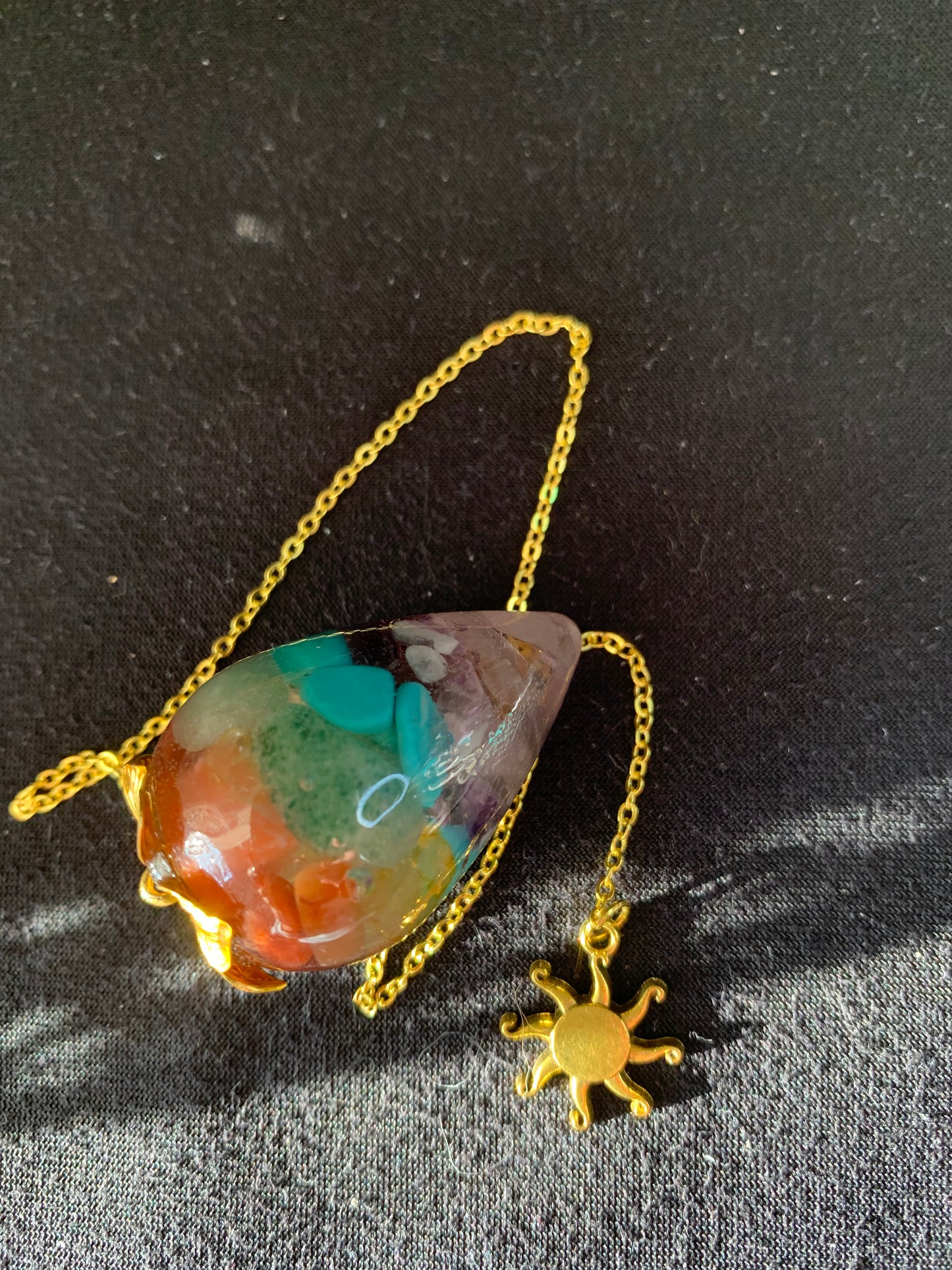 Pendule aux sept chakras